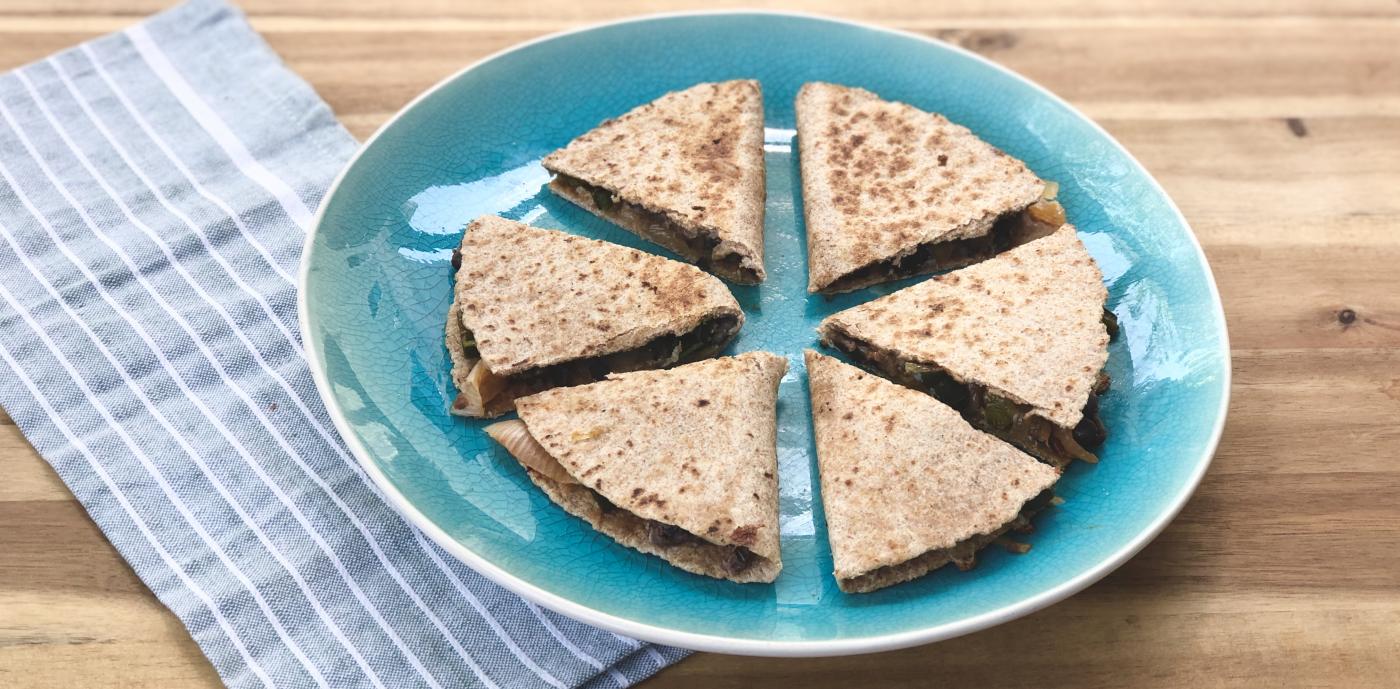 quesadillas made from whole wheat tortillas cut into wedges on a plate