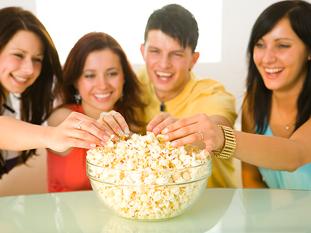 People eating popcorn