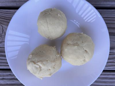 balls of dough on a white dish