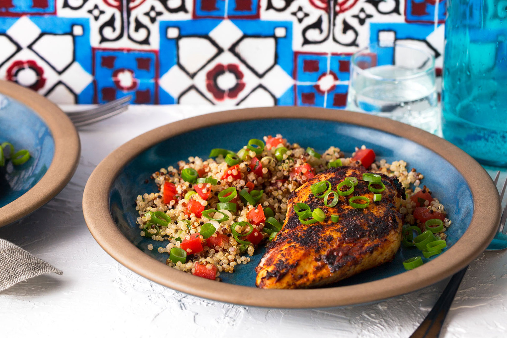 Lebanese-style chicken breasts with quinoa and tomato tabbouleh