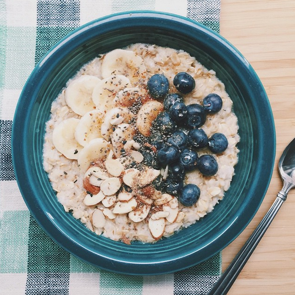 Bowl of oatmeal with bananas and blueberries
