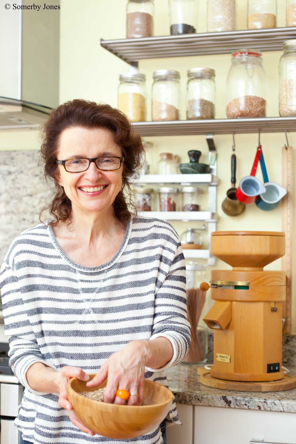 Maria Speck with a Grain Mill