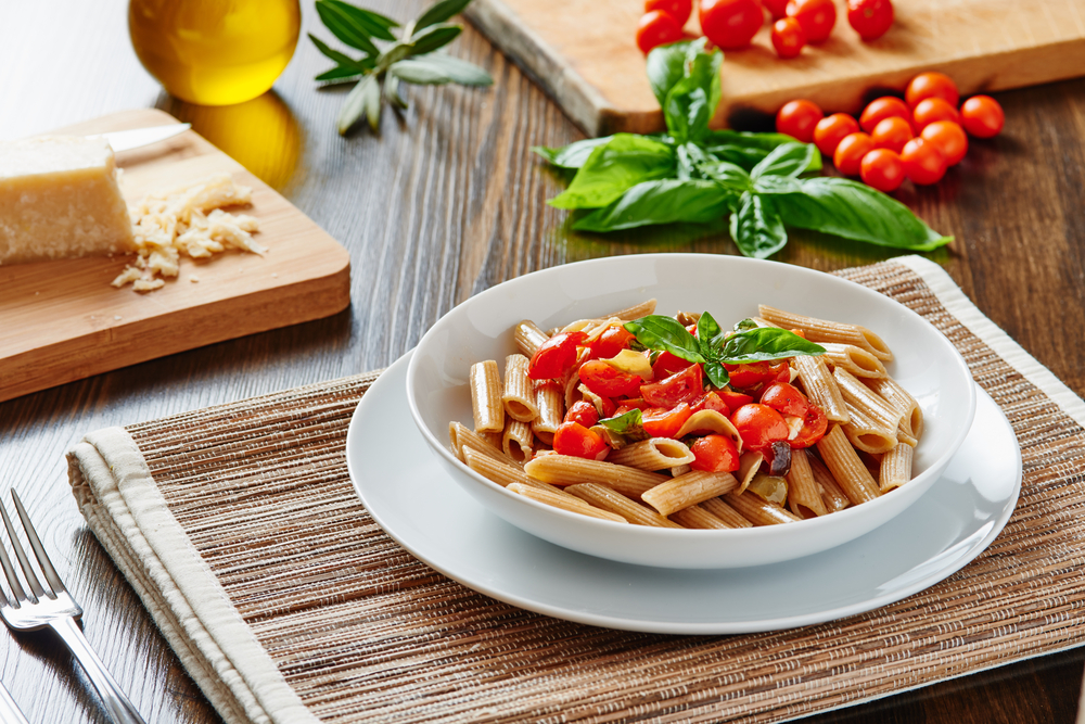 PastaMeal-WholeGrain-Penne-Tomatoes-shutterstock_313122035-pasta-tomato.jpg