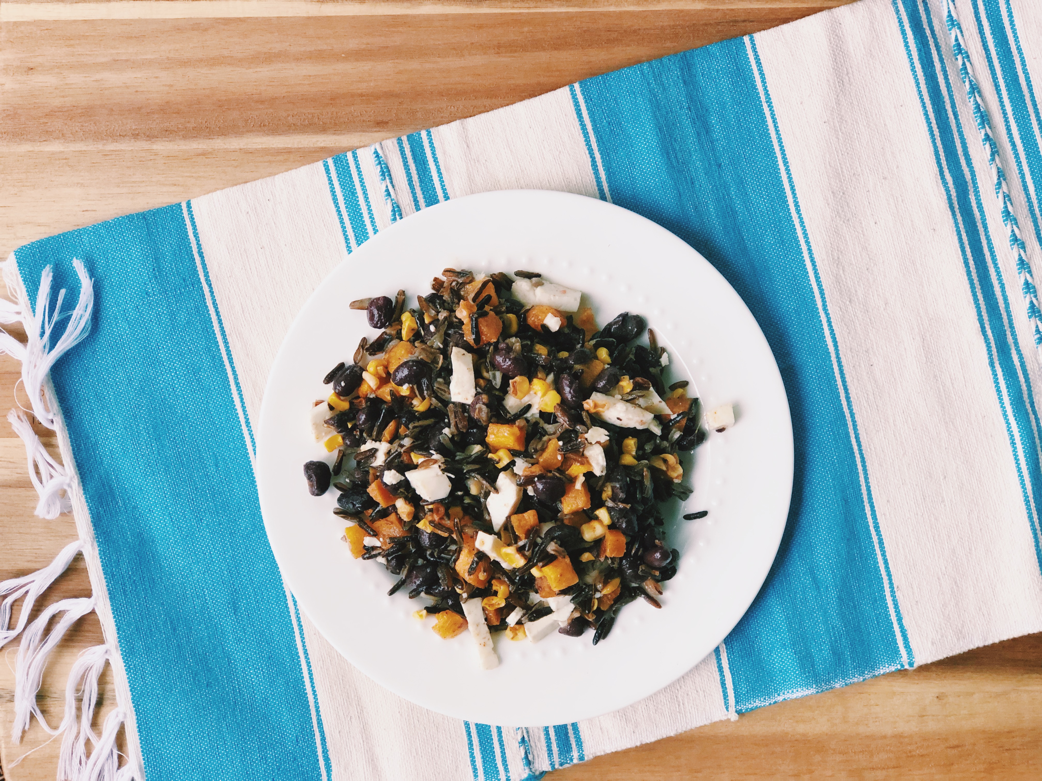 Wild rice salad with corn, butternut squash, and black beans