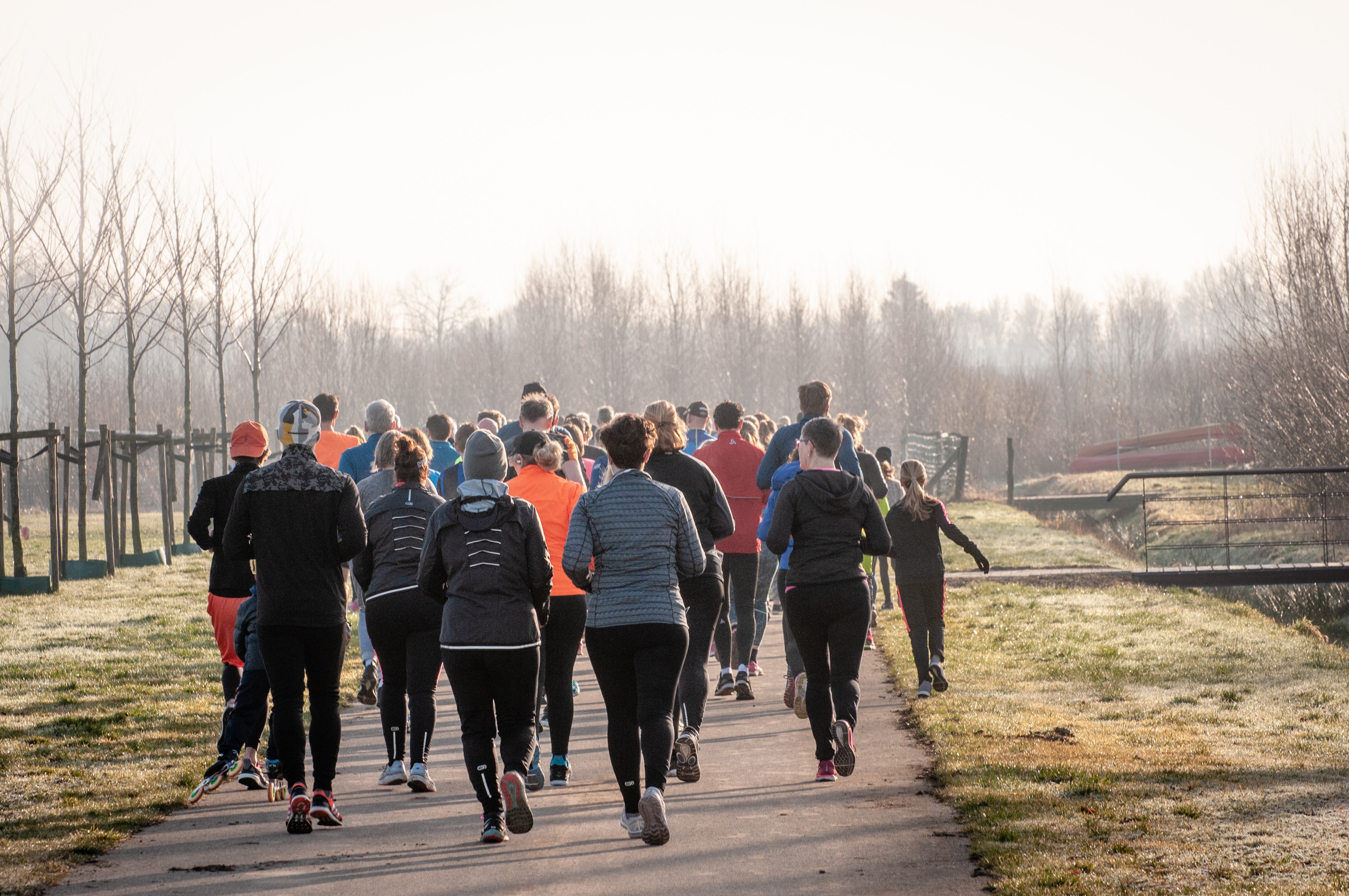 Group of people jogging in winter