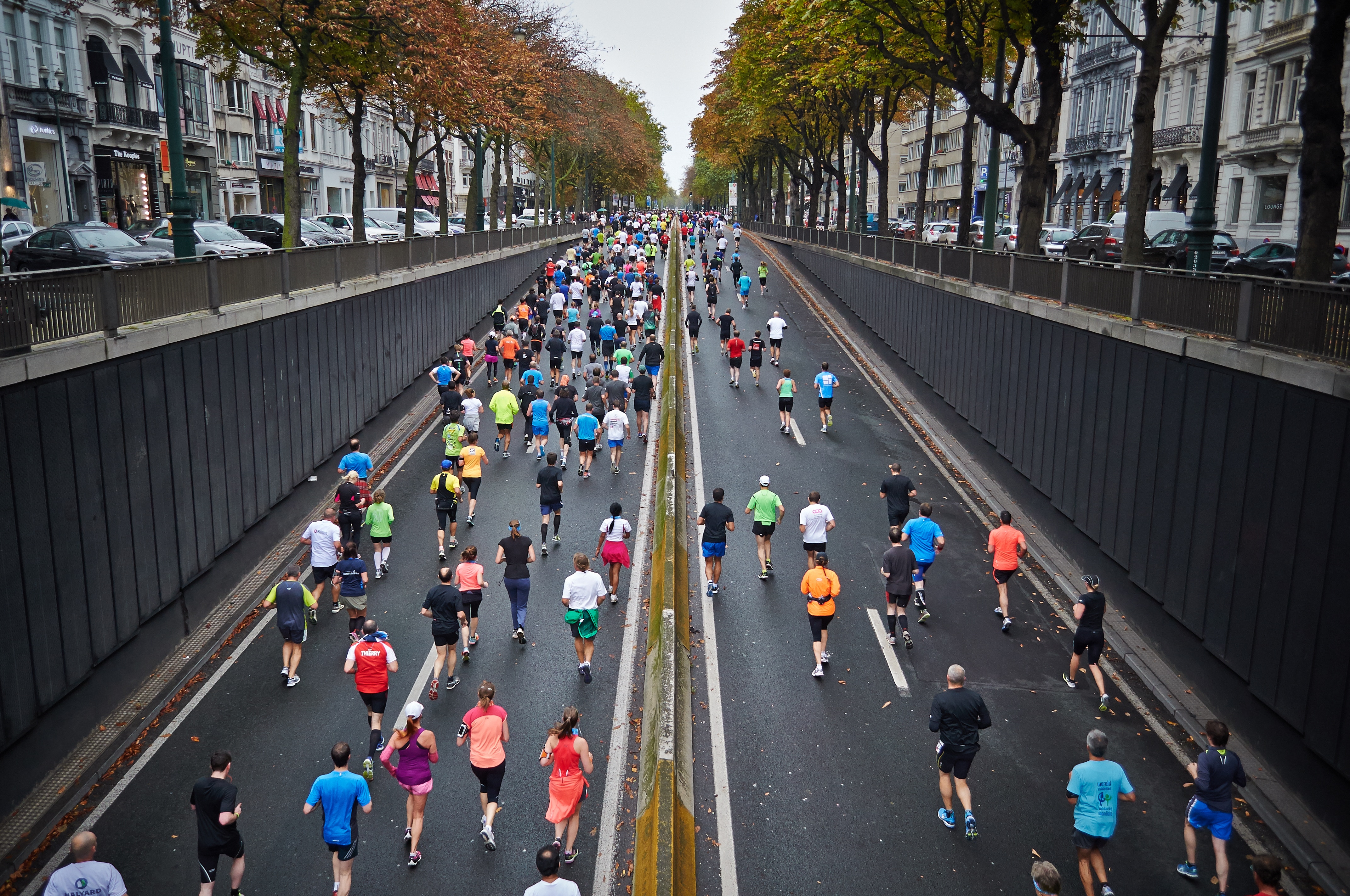 people running in street